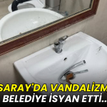 Dirty bathroom sink with mirror reflection