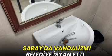 Dirty bathroom sink with mirror reflection