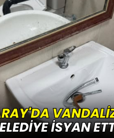 Dirty bathroom sink with mirror reflection